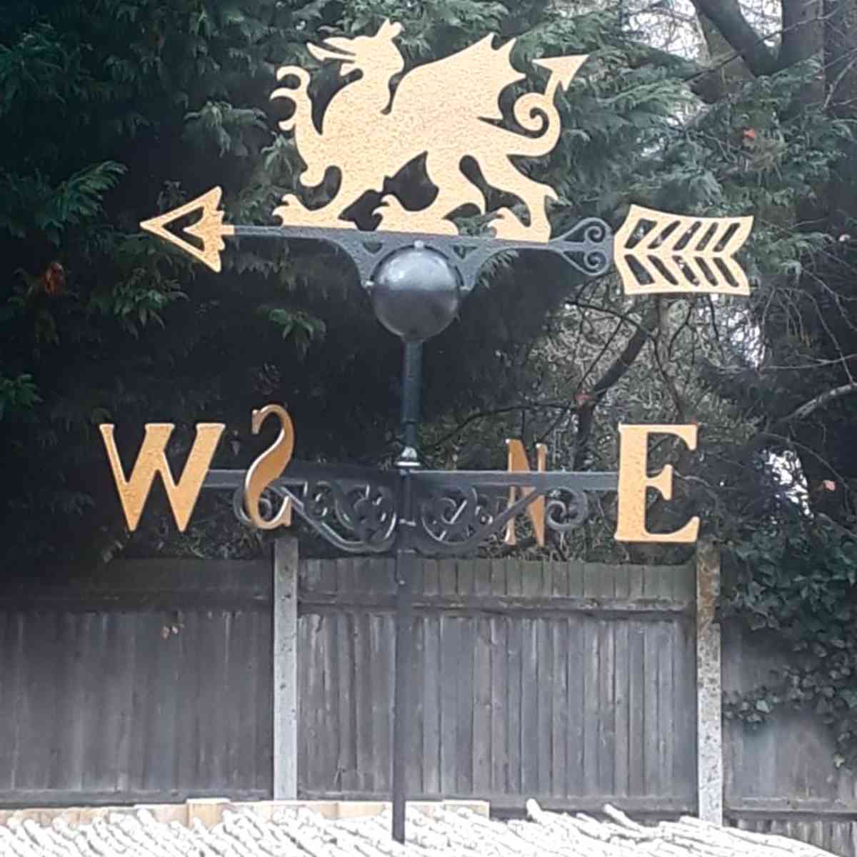 gold welsh dragon weathervane installed